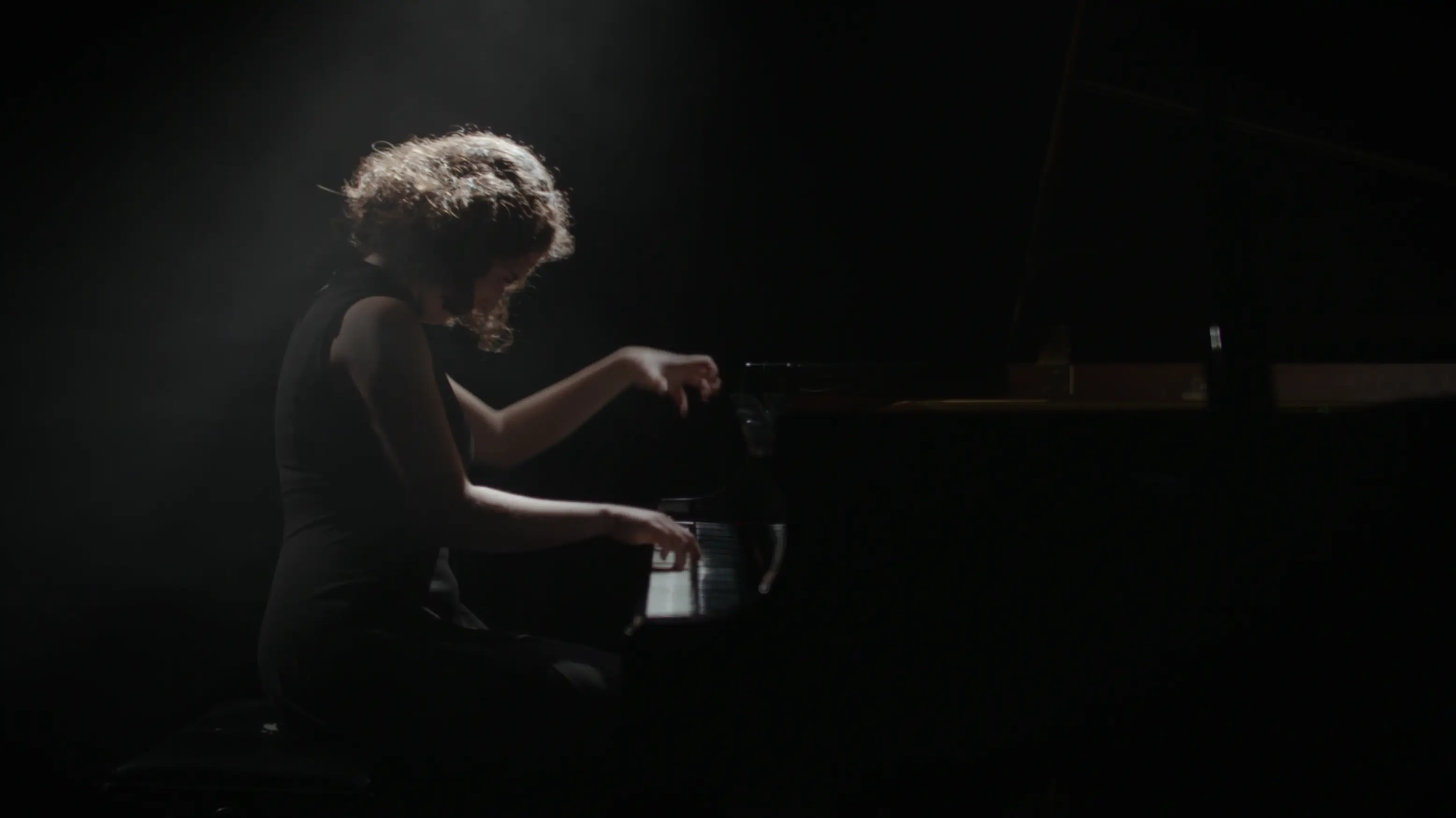 woman playing piano